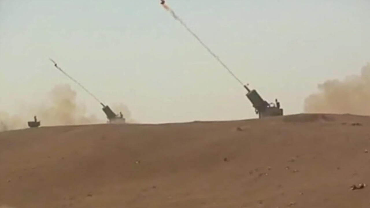 Saudi air defense systems visible on a military installation following a missile strike