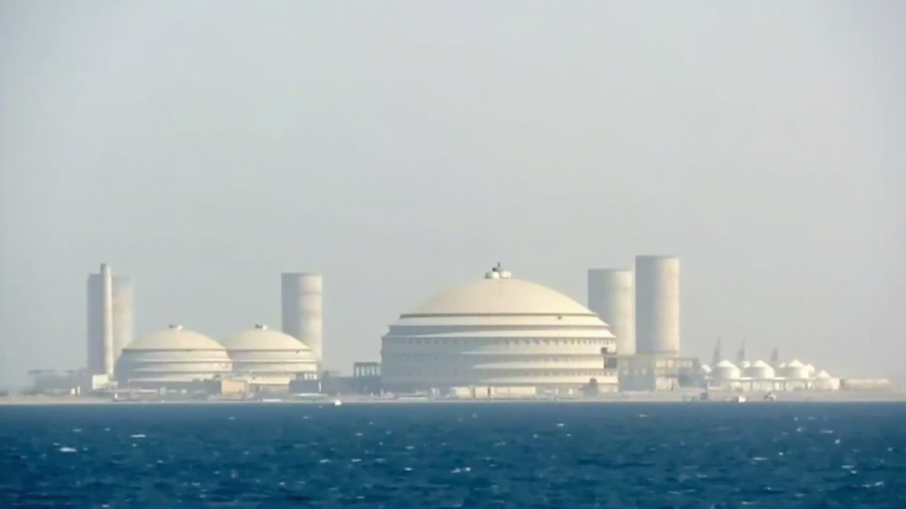 The Bushehr nuclear power plant on Iran's Gulf coast, cooling towers visible against the horizon