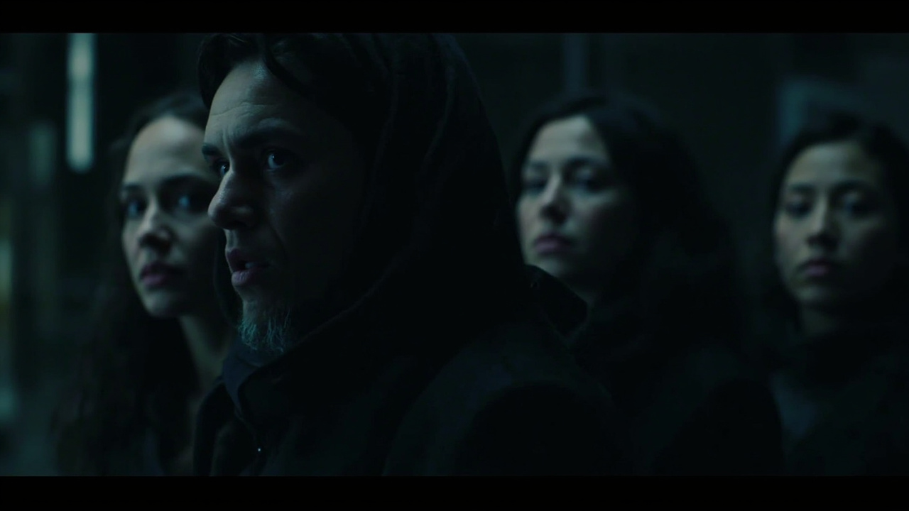 Dark promotional still from The Boys Season 5 showing the main cast in dramatic lighting against a chaotic urban background