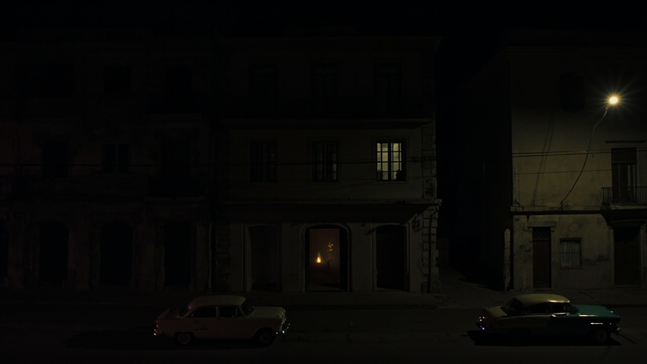Havana neighborhood in partial darkness with one lit building