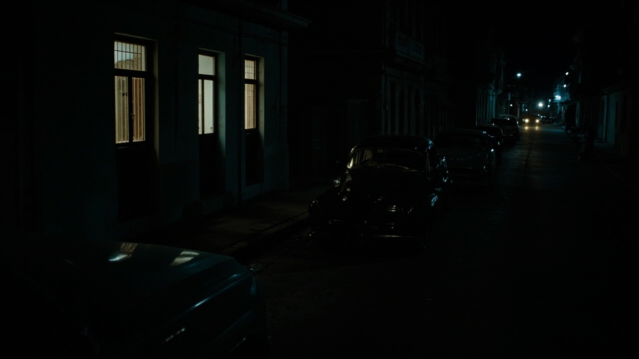 Havana neighborhood in darkness with a single lit window