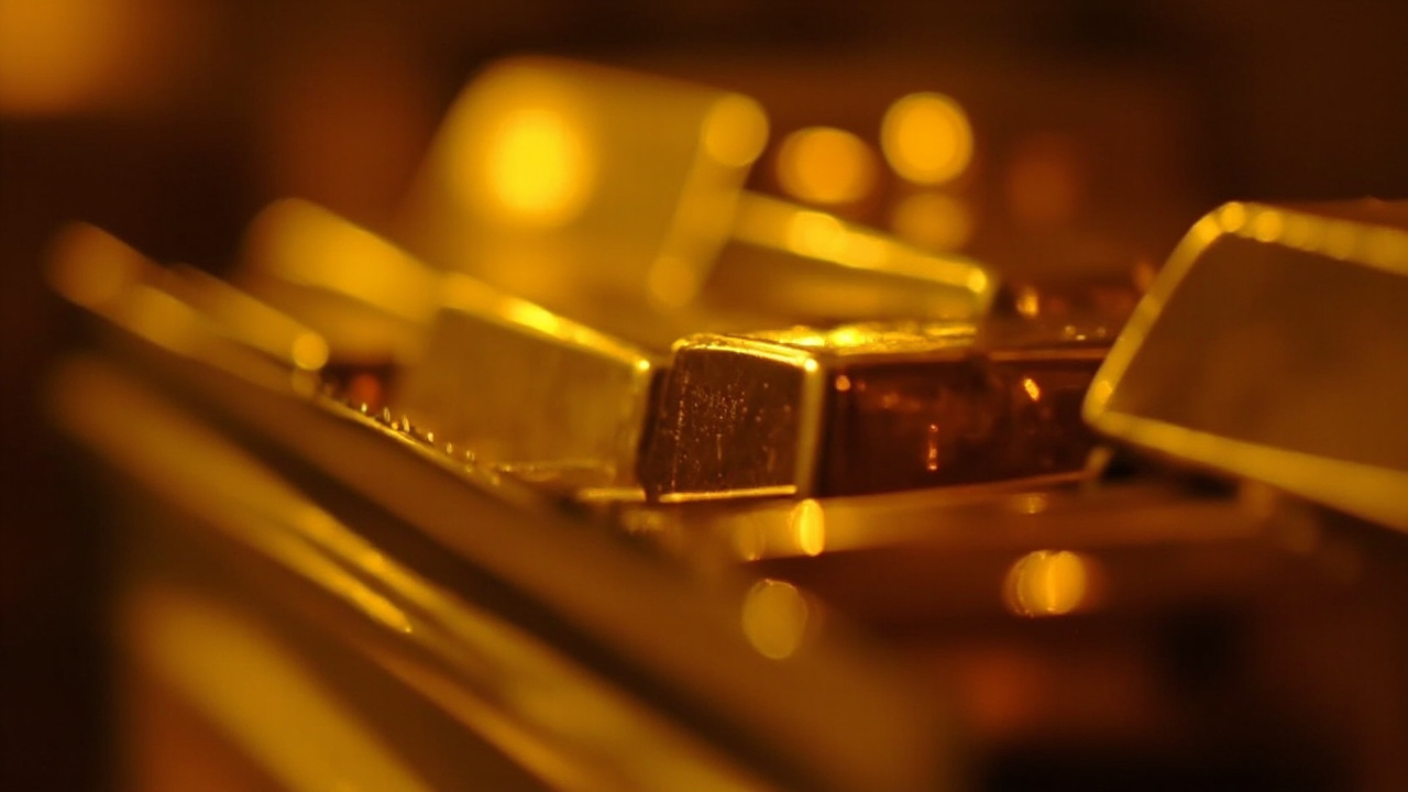 Stacked gold bars in a central bank vault with soft lighting reflecting off polished surfaces