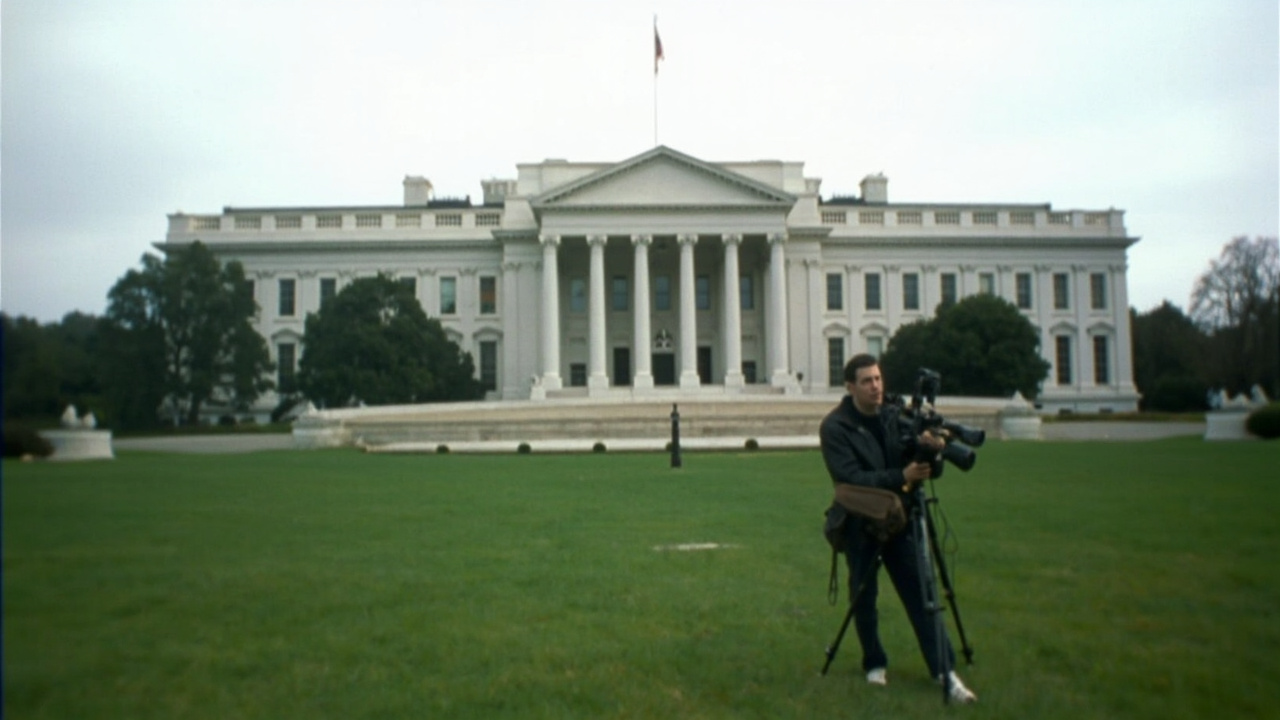 The Pentagon building exterior with a news camera crew set up on the grass in front