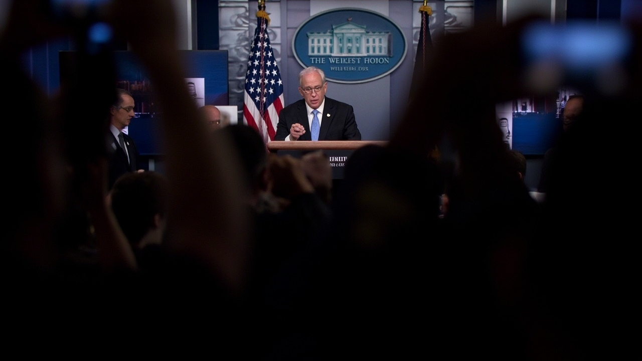 Defense Secretary Pete Hegseth at a Pentagon podium with military flags behind him