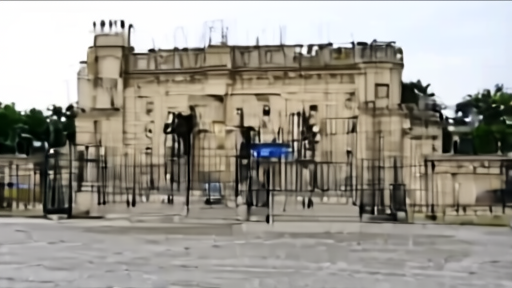 The Palais de Justice on the Île de la Cité at morning, iron gates closed, one officer at the arch.