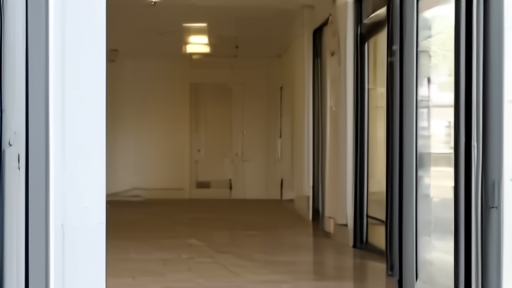 Pentagon river entrance at morning, closed corridor signage partially visible through the glass.