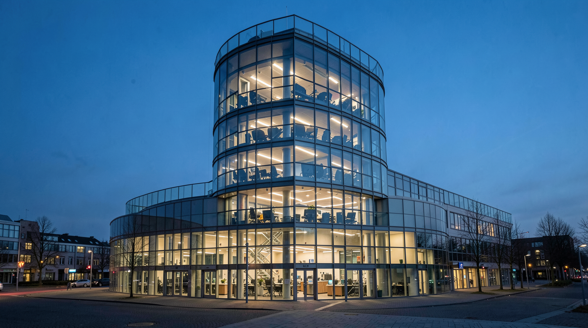 ECB supervisory tower in Frankfurt at dusk with interior office lights on