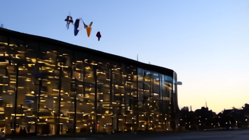 NATO headquarters exterior in Brussels at twilight with member-state flags including Spain
