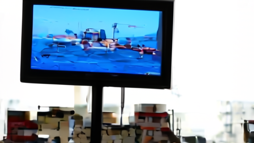 A gas-station price board reflected in a car window with a cargo ship on television