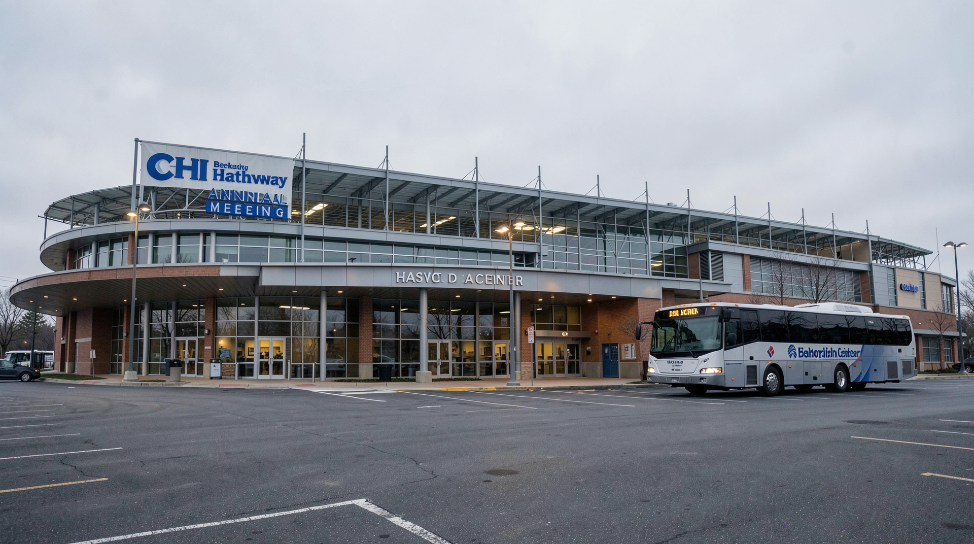 The CHI Health Center arena in Omaha at first light, the Berkshire signage visible above empty parking lots and a single chartered media bus.
