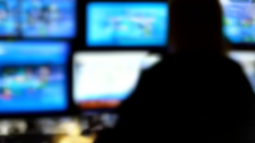 ABC News studio control room with broadcast monitors