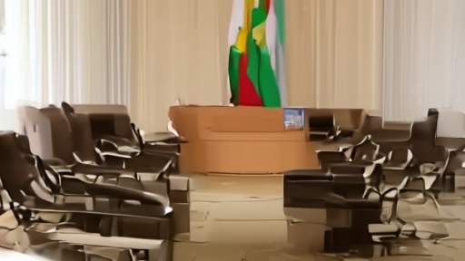 A Karachi finance ministry conference room with empty chairs around a long table, an IMF flag absent from the lectern