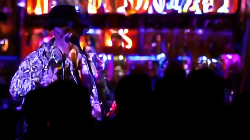 Country singer in black hat and rhinestone jacket leaning into a microphone on a small honky-tonk stage, neon beer signs glowing behind him, audience in deep silhouette.