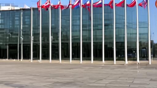 International Monetary Fund headquarters in Washington at midday with flags and an empty plaza