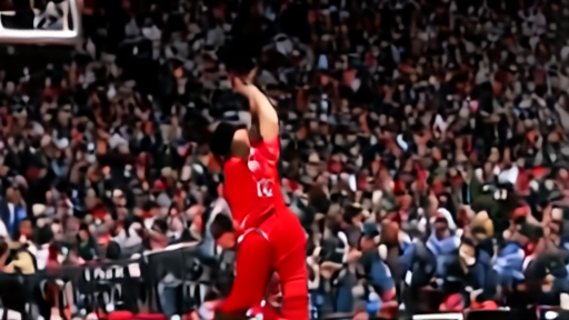 RJ Barrett rises for a three-pointer with the Toronto Raptors crowd reaching toward him as Cleveland defenders close out.