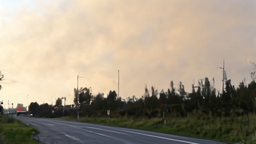 Smoke from a slash-pine forest fire rising over a Georgia two-lane highway, fire trucks parked along the shoulder, an evacuation sign visible.