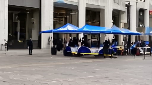 Federal courthouse in downtown Oakland with media tents on the plaza.