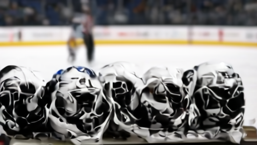Three goalie masks on a bench facing an Avalanche forward skating past during warmups.