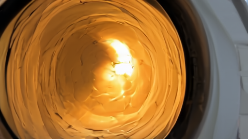 Particle detector tunnel with a small confidence limit chart glowing nearby