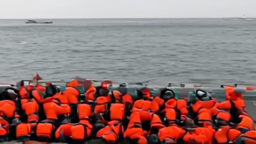 A tanker muster station with orange life vests laid out beside a chart of Hormuz traffic lanes