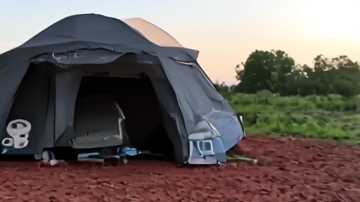 An Africa CDC mobile lab tent staked into red Ituri soil with a clinician in PPE walking a sample case toward a generator-lit centrifuge