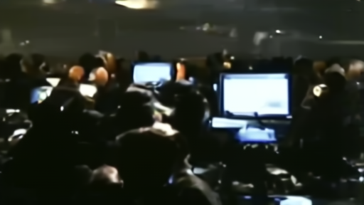 Air-defense crews working at consoles under dim command-center lights