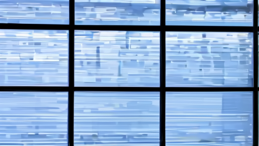 The exterior of a Samsung memory fabrication building in Suwon at evening, clean-room aesthetic visible through tall windows