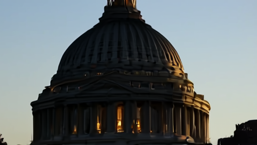The U.S. Capitol dome at dusk, lit from below, with the empty Senate chamber rotunda windows glowing
