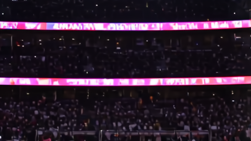 The Knicks' bench in Cleveland late in the fourth quarter, Brunson at the foreground stripping his shooting sleeve, the scoreboard reading 121-108 in the background