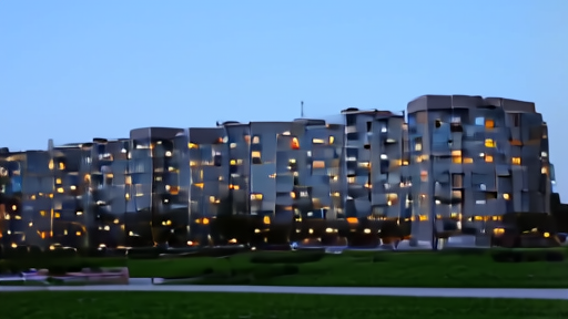 A row of contemporary mid-rise apartment buildings from an AvalonBay portfolio at twilight.