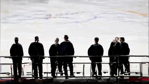 A hockey executive suite looks down on bright playoff ice after a win