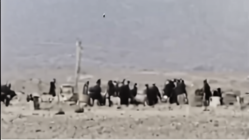 Families walking north from a southern Lebanese roadblock