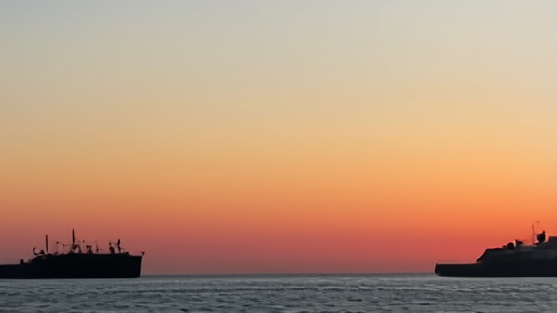 Oil tanker silhouette against a red Hormuz Strait sunrise with Brent price chart overlay