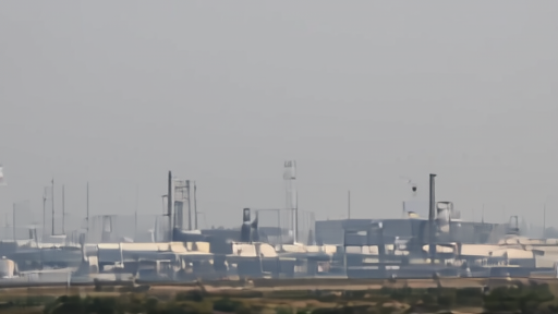 Oil tanker at terminal with pipeline infrastructure in background