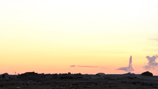 Smoke rising from Iranian military installation at dawn after US Tomahawk strike
