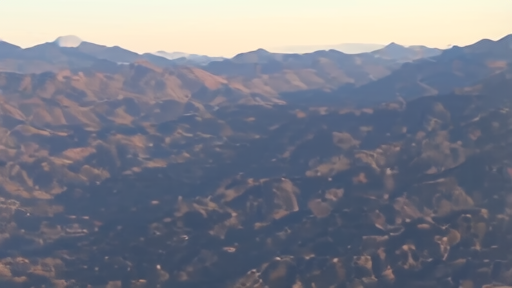 Rugged mountain terrain along the Pakistan-Afghanistan border at dawn