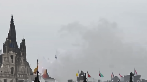 Smoke rises from a damaged Kyiv cathedral as summit flags appear on a distant screen