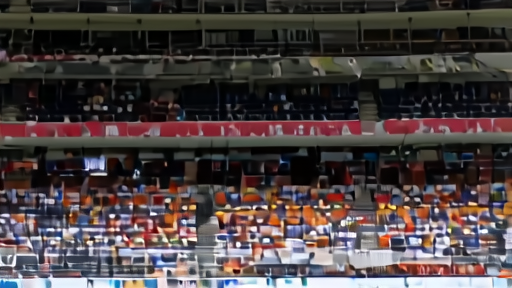 A World Cup stadium mid-match with whole upper-tier sections empty above a full lower bowl and lit scoreboard