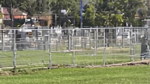 A row of temporary gas turbine generators fenced beside a data-center construction site, a home gas meter in the foreground